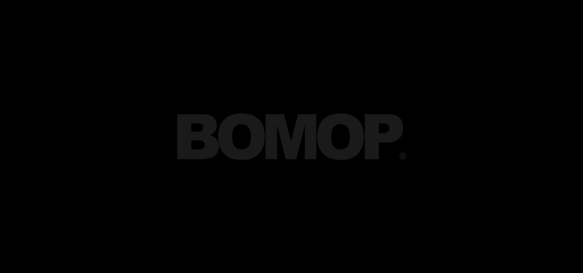 Fondo negro con logo de Bomop